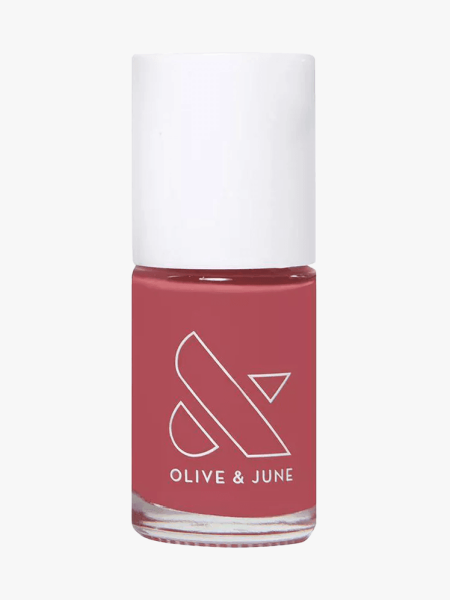 Olive & June Long-Lasting Polish in branded component on a light gray background