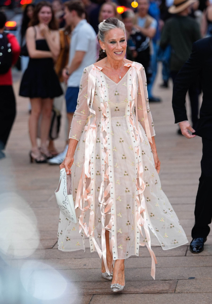 Sarah Jessica Parker in a sheer pink dress with ribbons